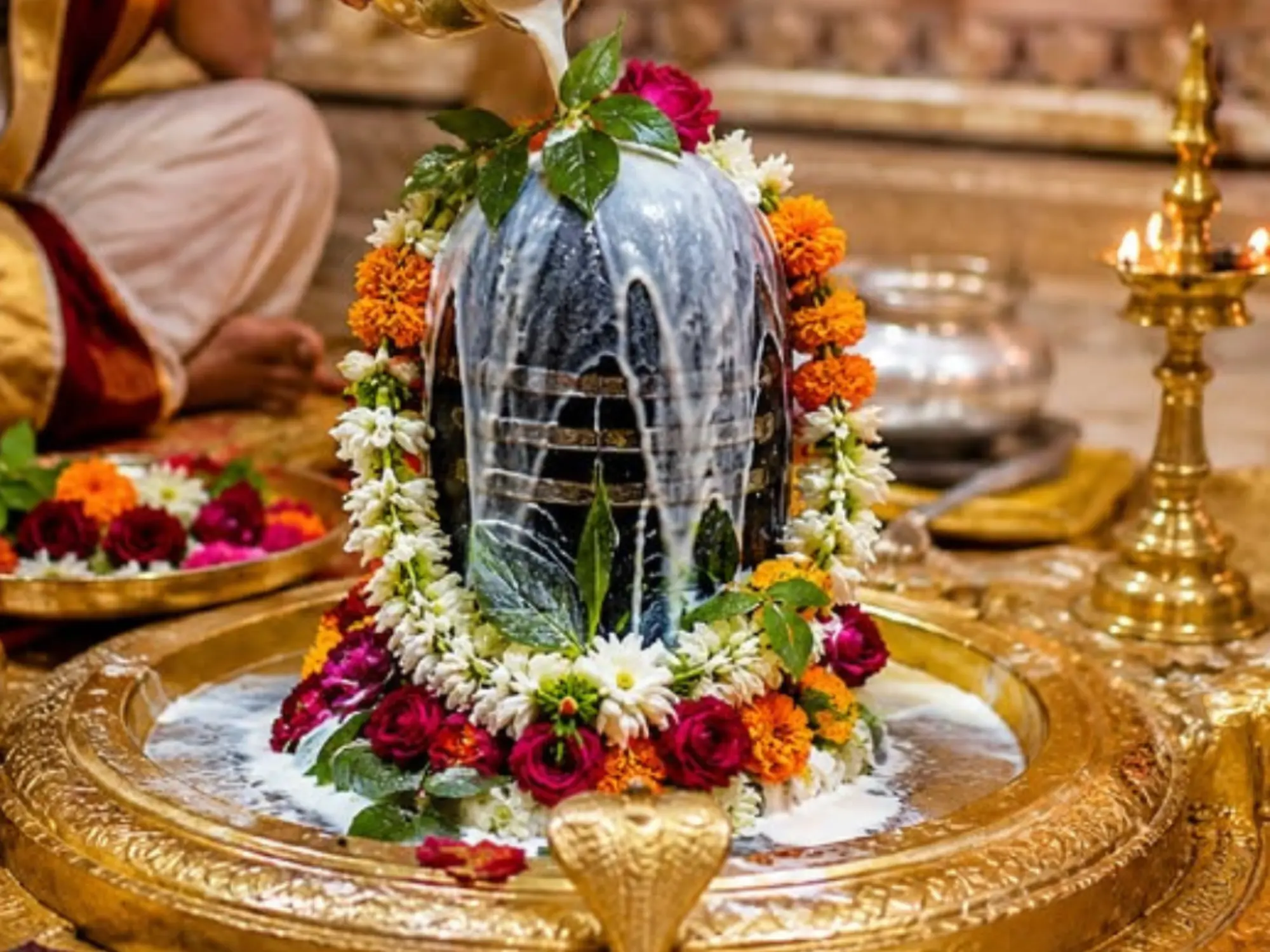 Shivling adorned with flower garlands during Rudrabhishek